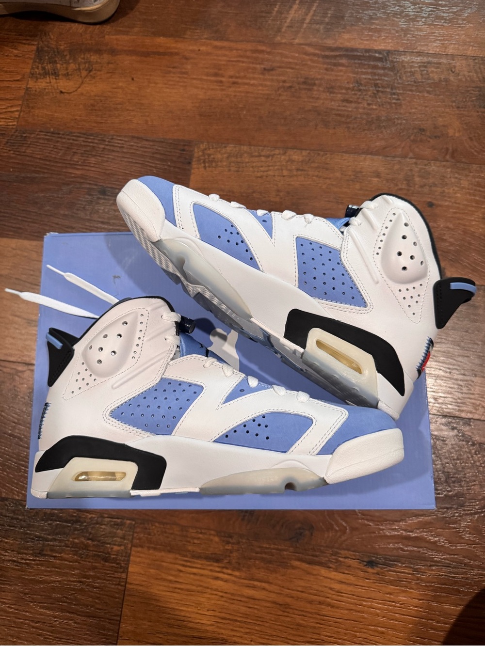 Jordan UNC White Retro High-Top Sneakers in White and Light Blue